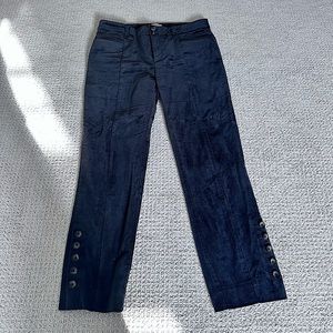 Anthropologie Black velvet crop pants with button detail bottom of the pants.